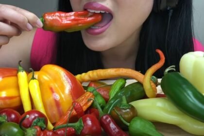 girl eating different types of pepper