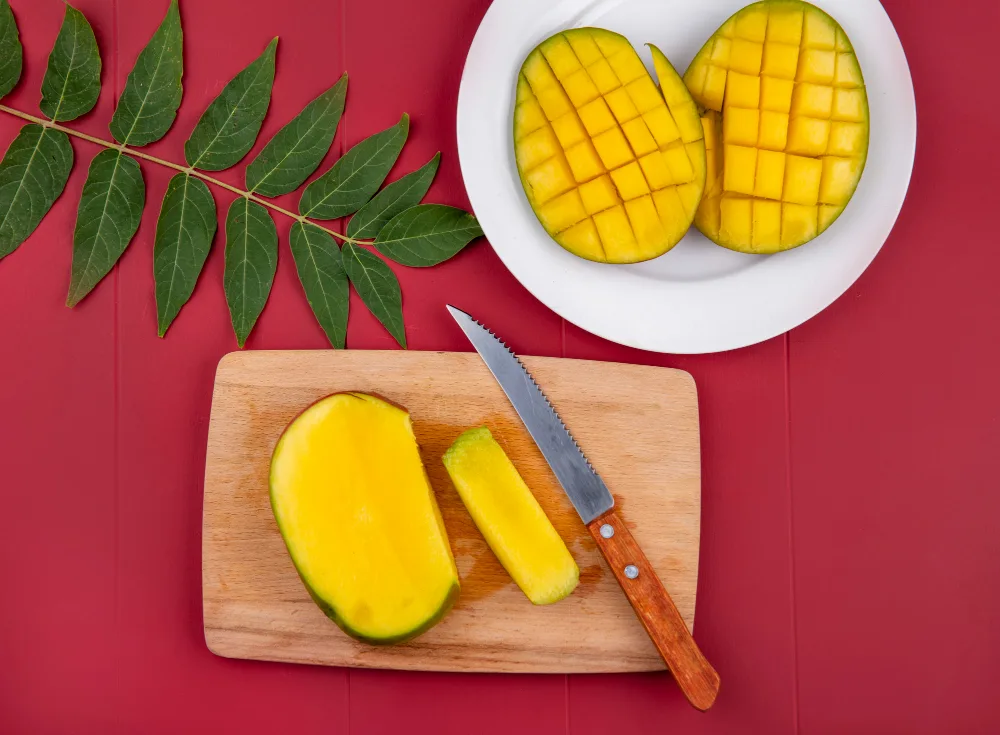 mango-gets-sliced-on-cutting-board